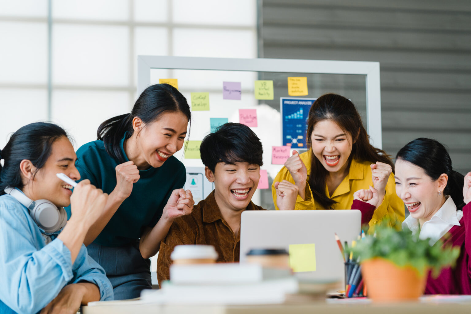 group asia young creative people smart casual wear discussing business celebrate giving five after dealing feeling happy signing contract agreement office coworker teamwork concept scaled